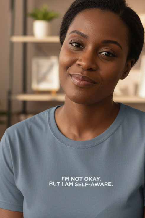African American woman wearing I'M NOT OKAY BUT I AM SELF-AWARE shirt