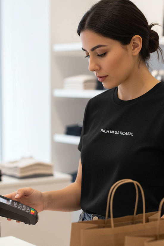 Middle Eastern woman shopping wearing RICH IN SARCASM shirt