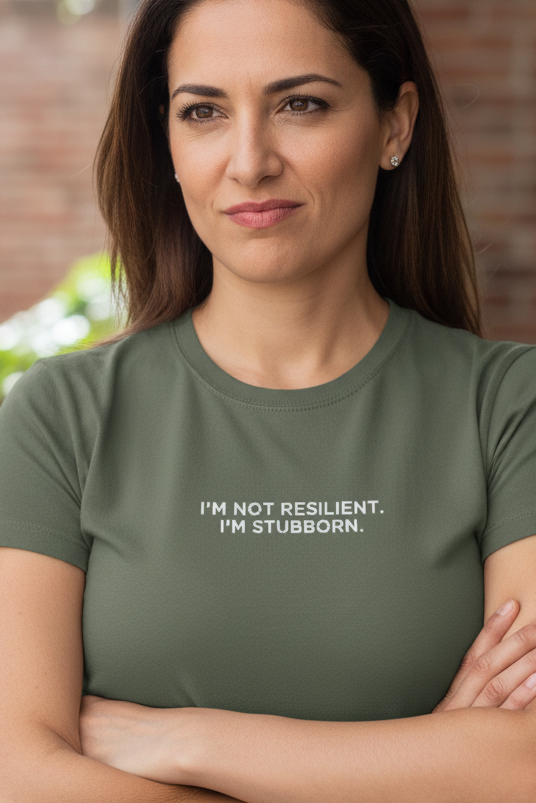 Middle Eastern woman wearing I'M NOT RESILIENT I'M STUBBORN shirt